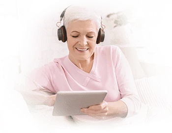 Adult woman smiling while using Gamma Game cognitive training on tablet